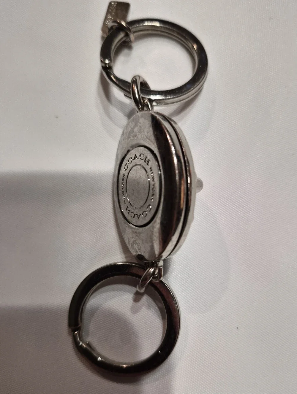 Coach Studded Leather Turnlock Keychain